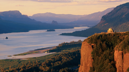 An idyllic Oregon coast-scape bathed in yellow sunlight