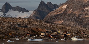 Sermilik Fjord, Greenland with town and glacier