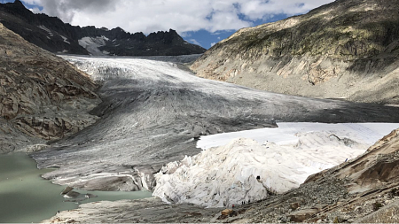 White blankets cover the middle right section of the Rhône Glacier in an attempt to slow ice melt. Photo: Mark Carey