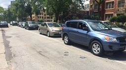 Cars lined up along North Prospect Avenue in Milwaukee