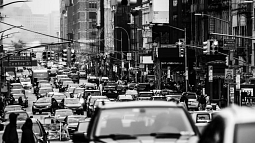 Black and white image of heavy traffic clogging a city street. Photo by peeterv/istock. 
